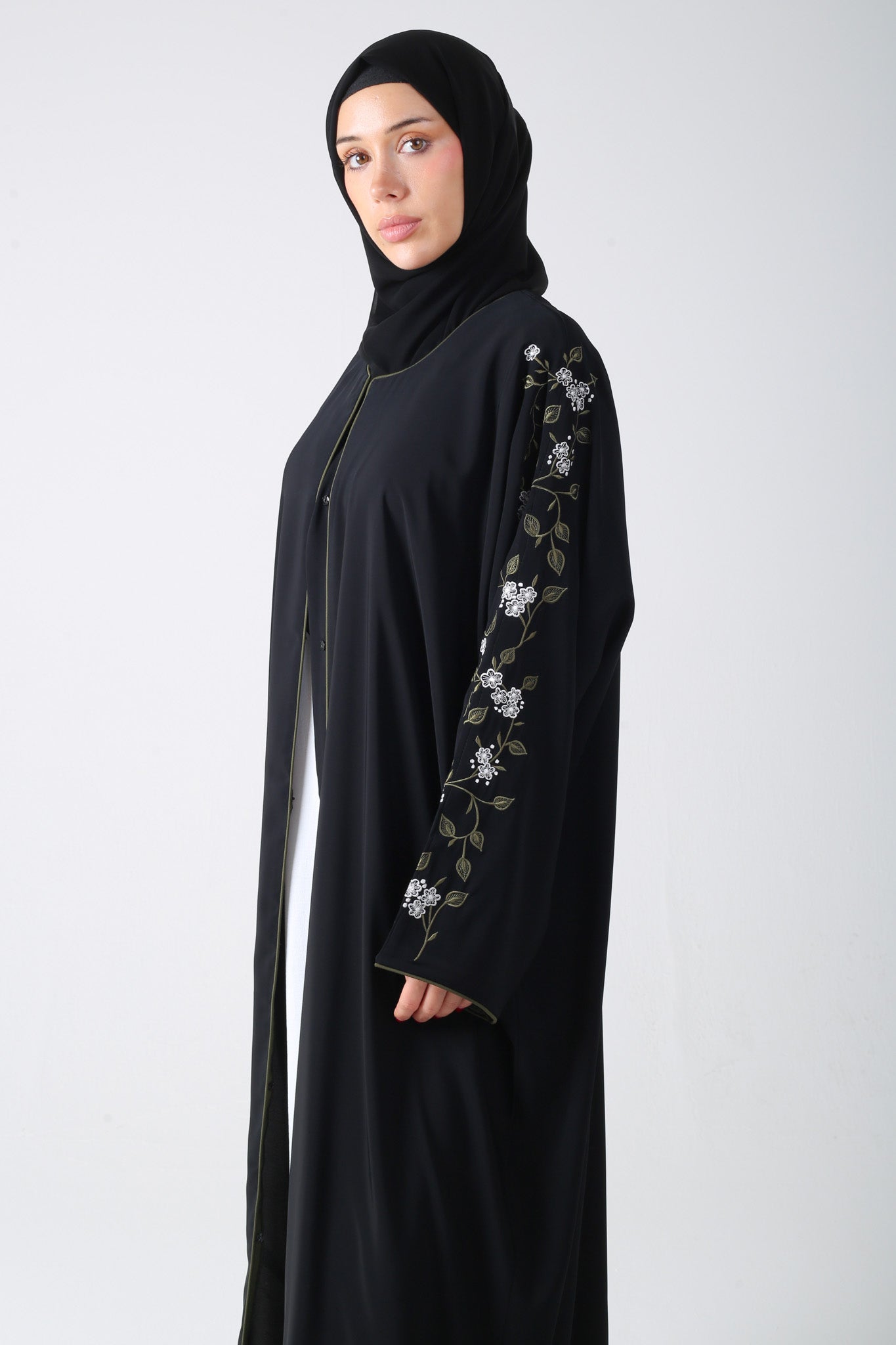 side view of black batwing abaya