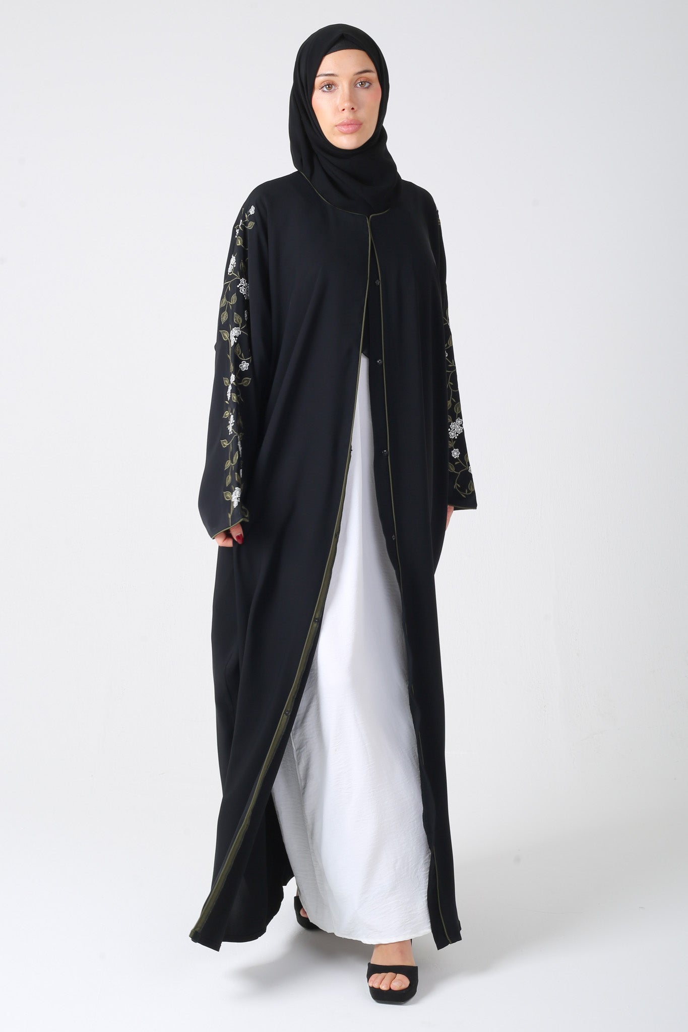 front view of black batwing abaya