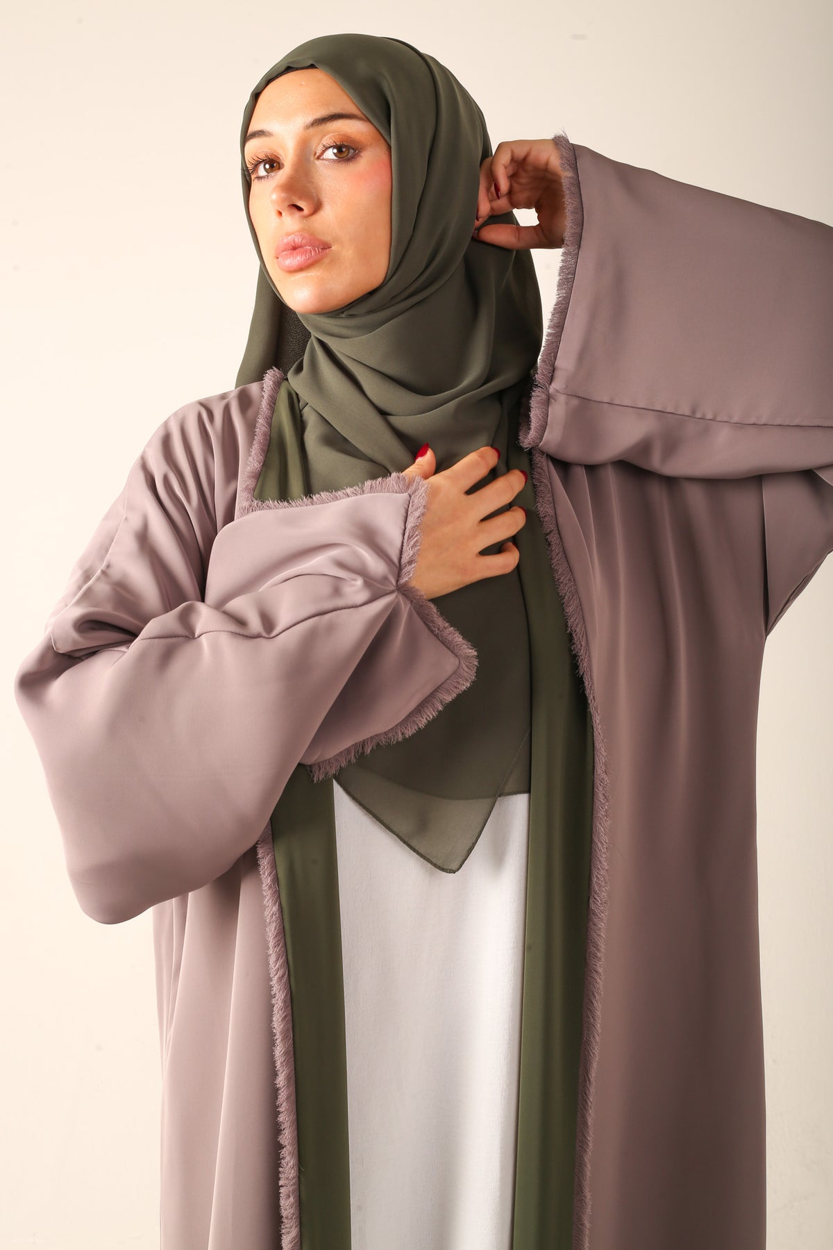 Reverse beige side of abaya front view closeup