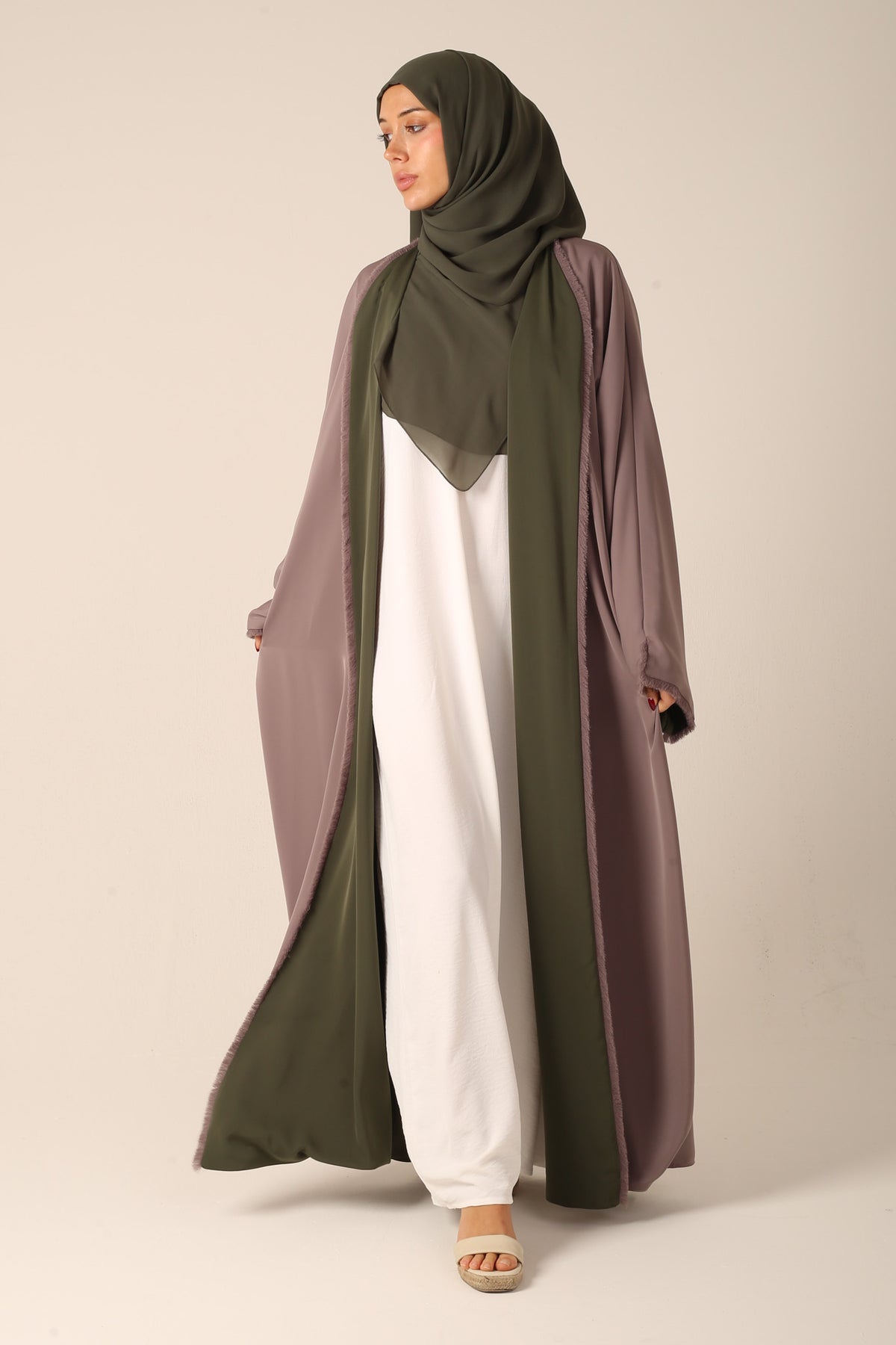 Reverse beige side of abaya front view