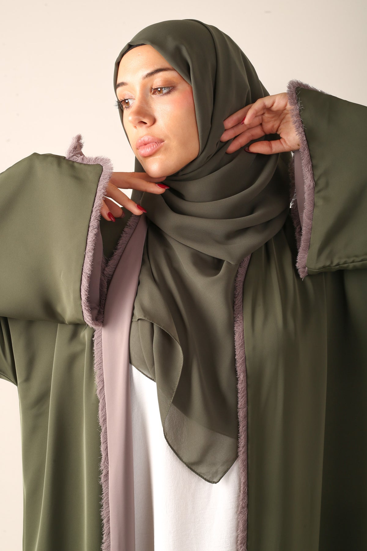 Green reversible abaya front view closeup