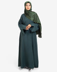 Plain linen dark green closed abaya with split cuffs front view