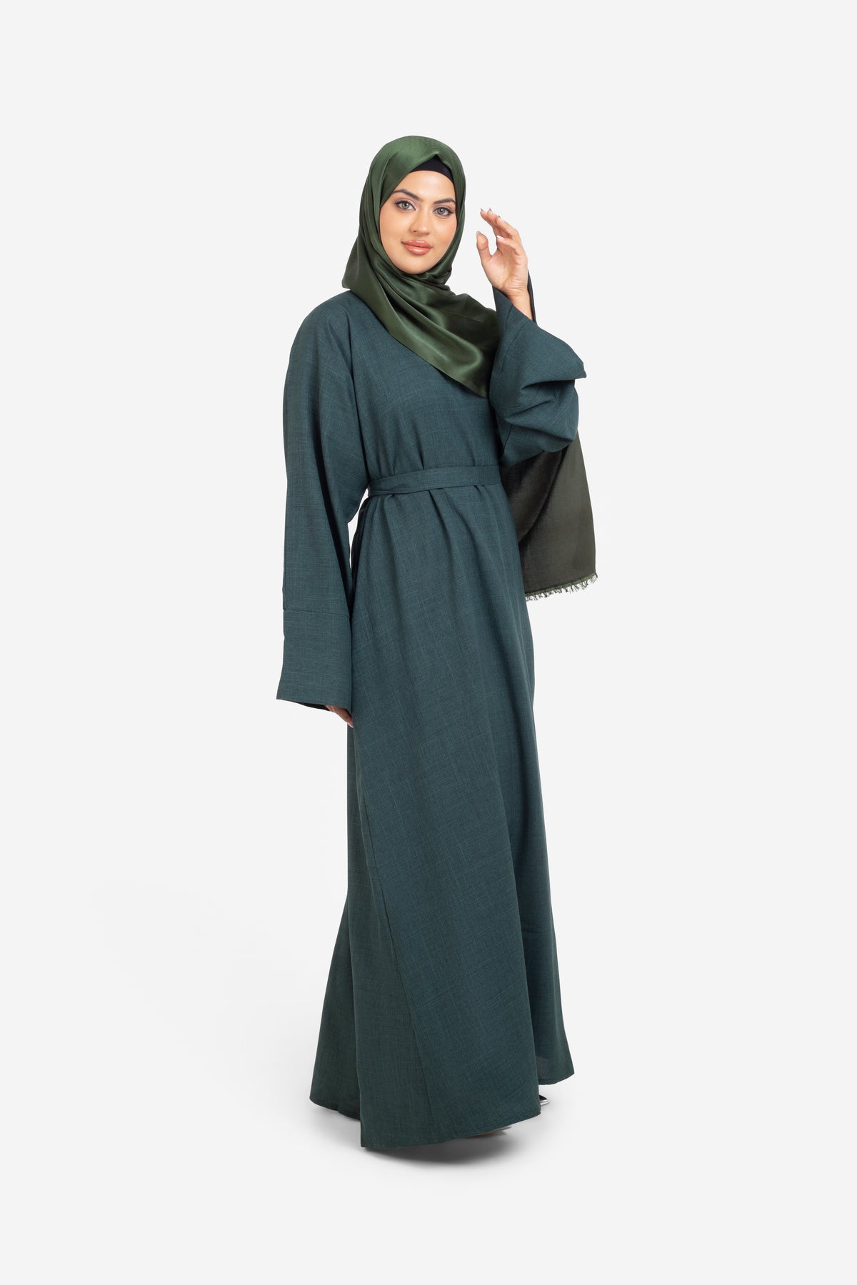 Plain linen dark green closed abaya with split cuffs side view